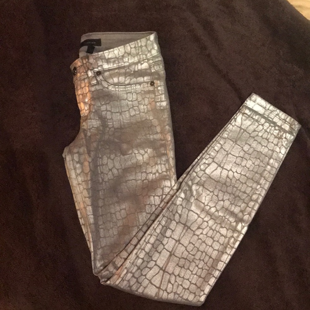 Metallic silver jeans with subtle animal print